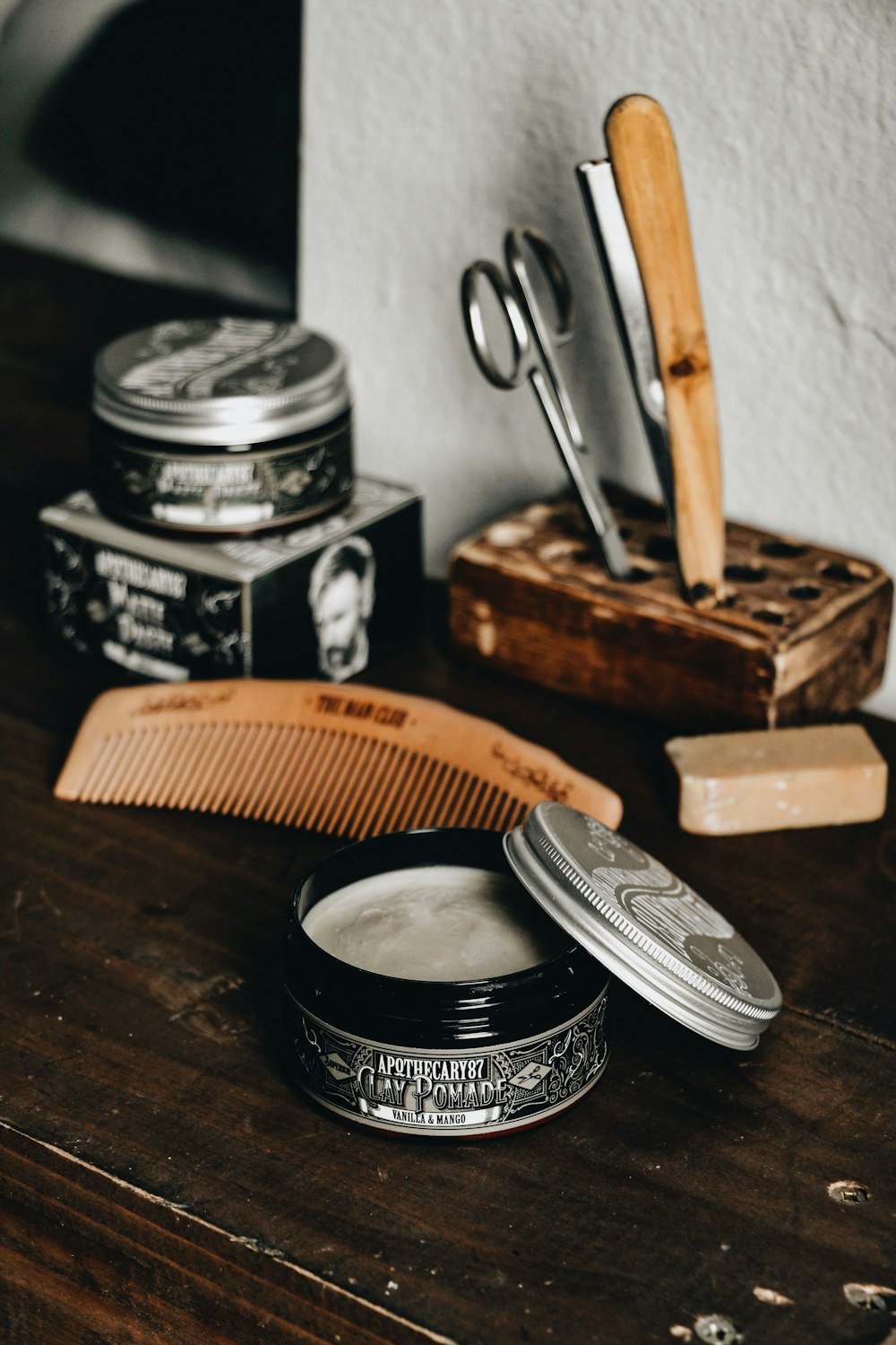 Classic barbering tools laid out on a counter